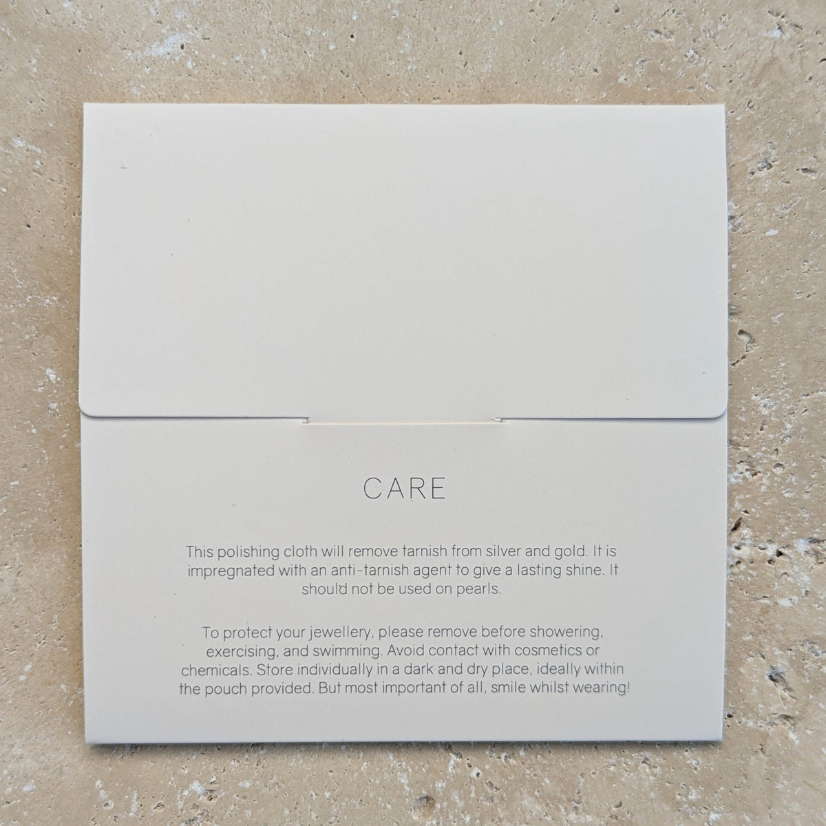 Back of envelope of jewellery polishing cloth