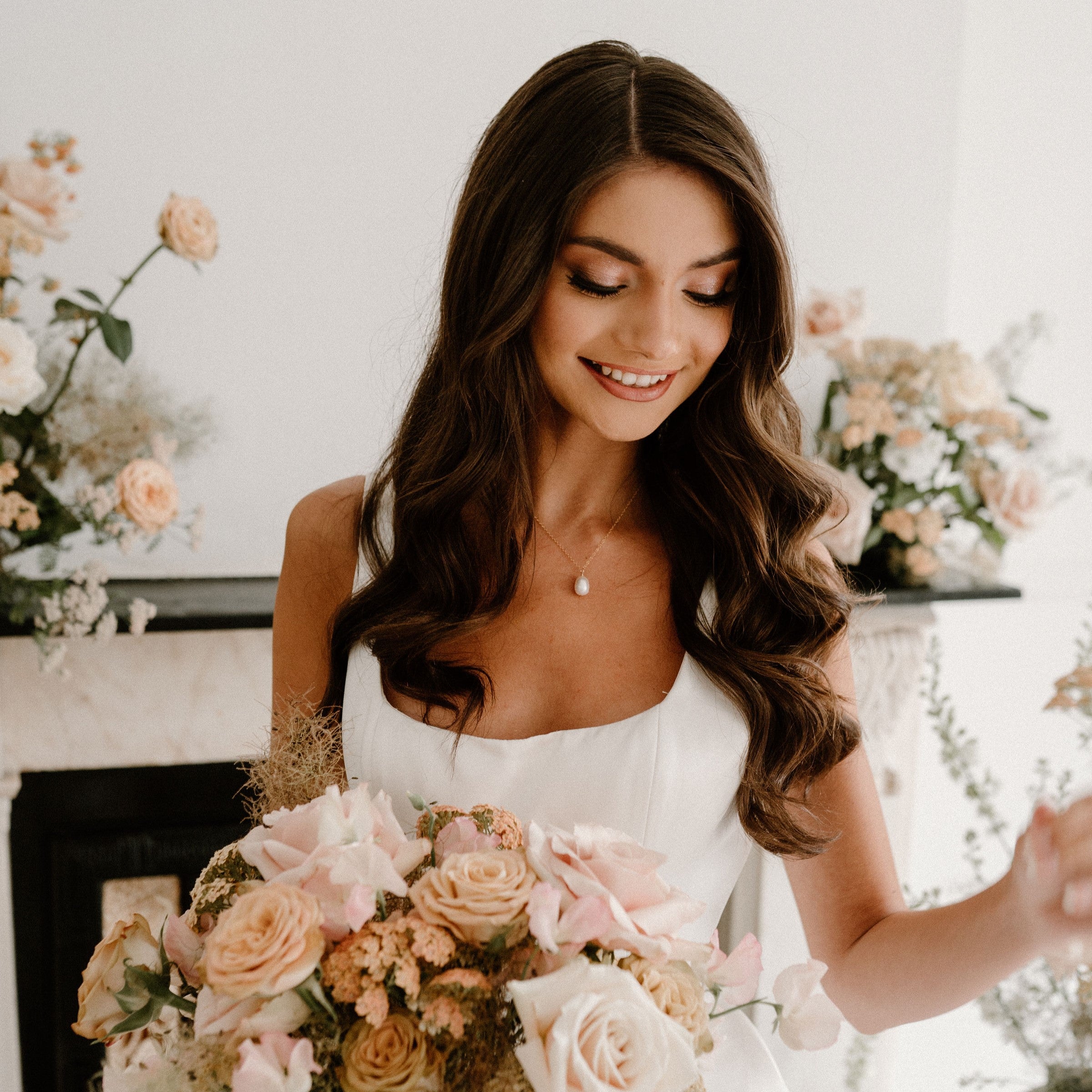 Model wearing gold filled chain necklace with baroque pearl pendant