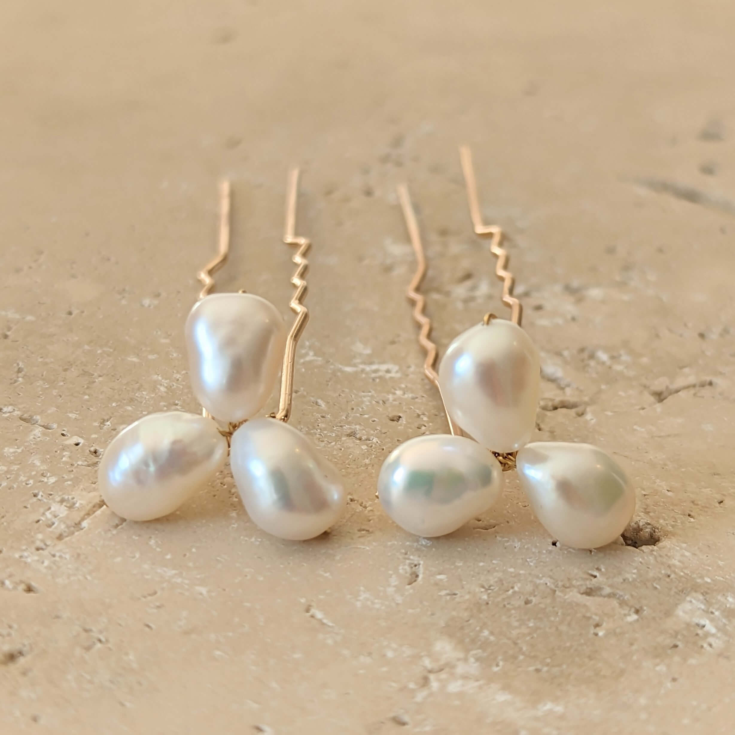 set of two medium pearl cluster hair pins in gold