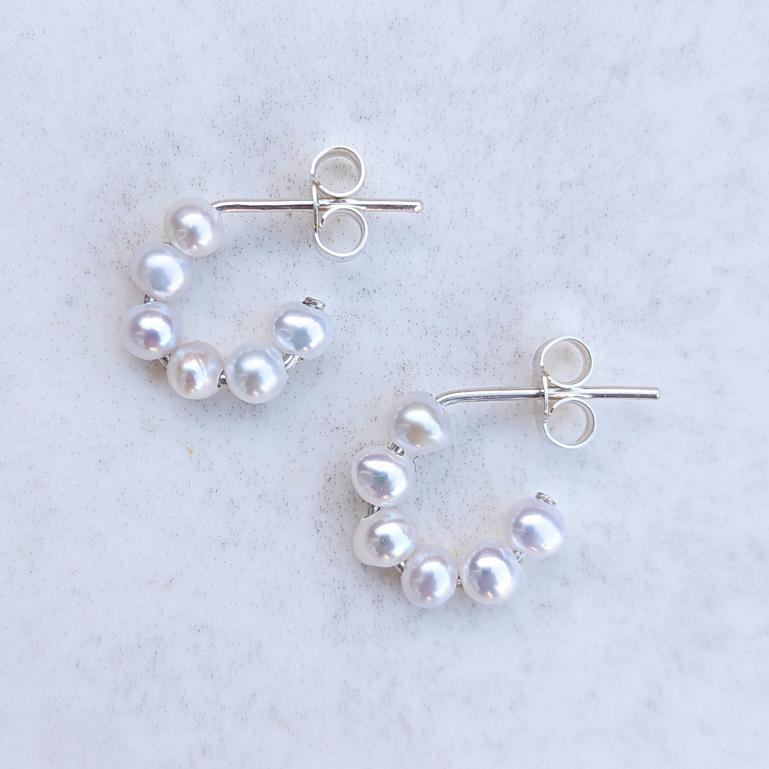 Pearl semi hoop earrings in sterling silver