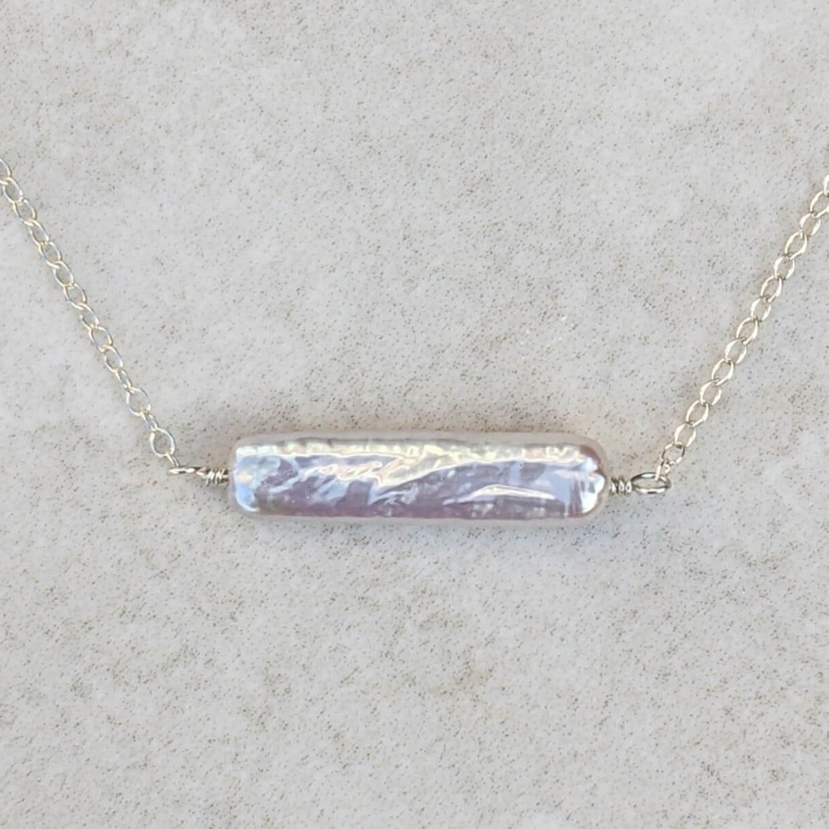 Rectangular shaped biwa pearl sideways on silver chain