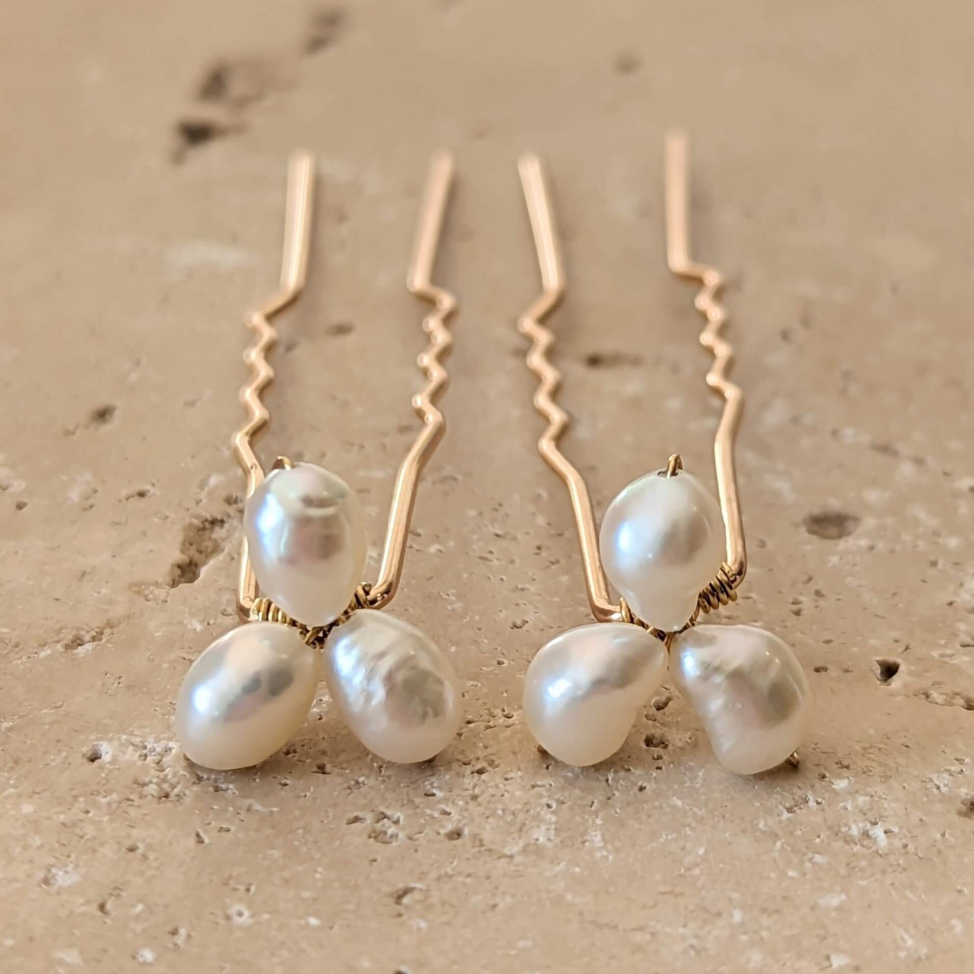 two small pearl cluster hair pins gold